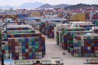 Containers are seen at the Yangshan Deep Water Port in Shanghai