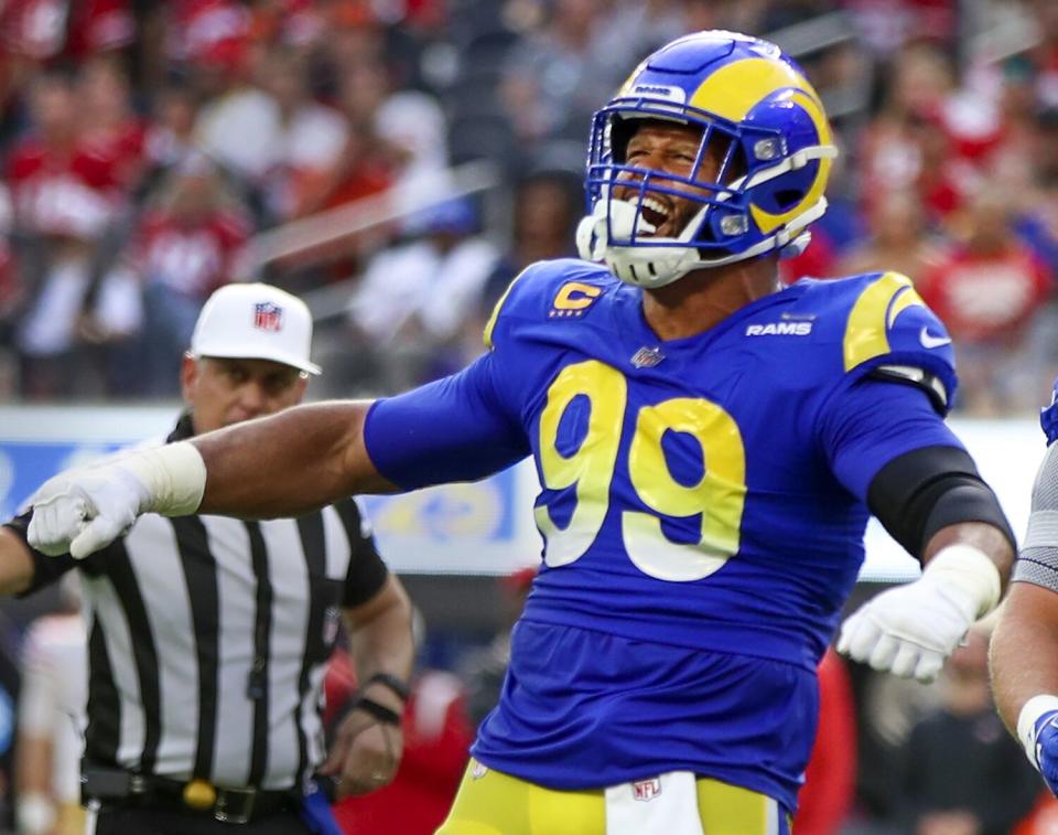 Rams defensive tackle Aaron Donald celebrates a sack of 49ers quarterback Jimmy Garoppolo in October.