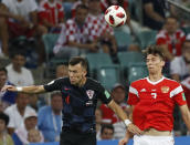 <p>Ivan Perisic and Ilya Kutepov challenge for the ball </p>