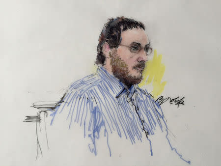 James Holmes sits in Arapahoe County District Court in Denver, Colorado on February 11, 2015, in this courtroom sketch. REUTERS/Bill Robles