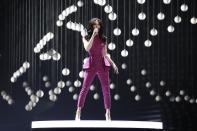 Austrian Conchita Wurst, 2014 Eurovision Song Contest winner, performs during the Eurovision final on May 23, 2015 in Vienna