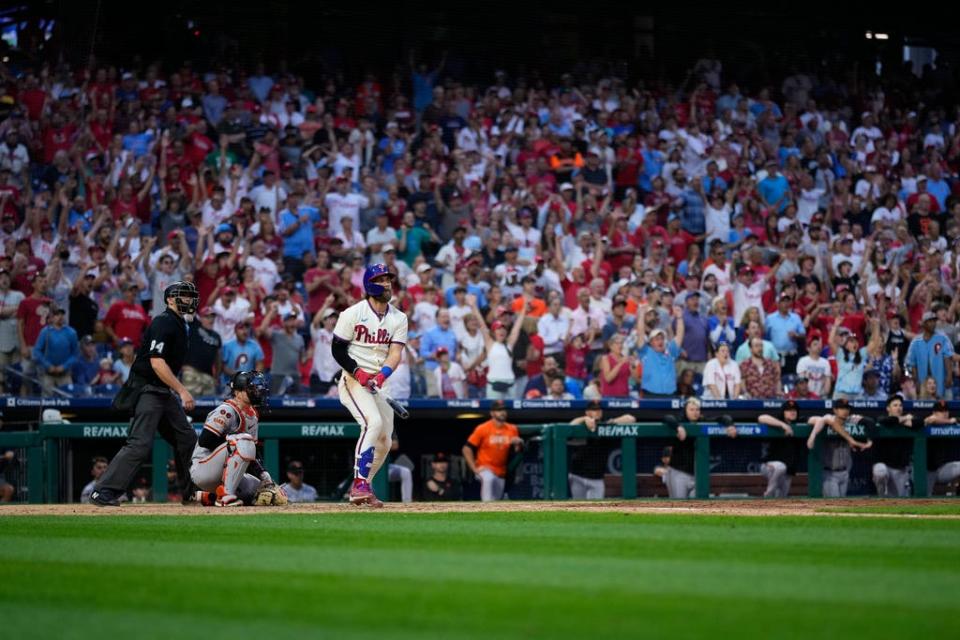 Philadelphia Phillies' Bryce Harper watches after hitting a home run during a baseball game, Wednesday, Aug. 23, 2023, in Philadelphia. (AP Photo/Matt Slocum)