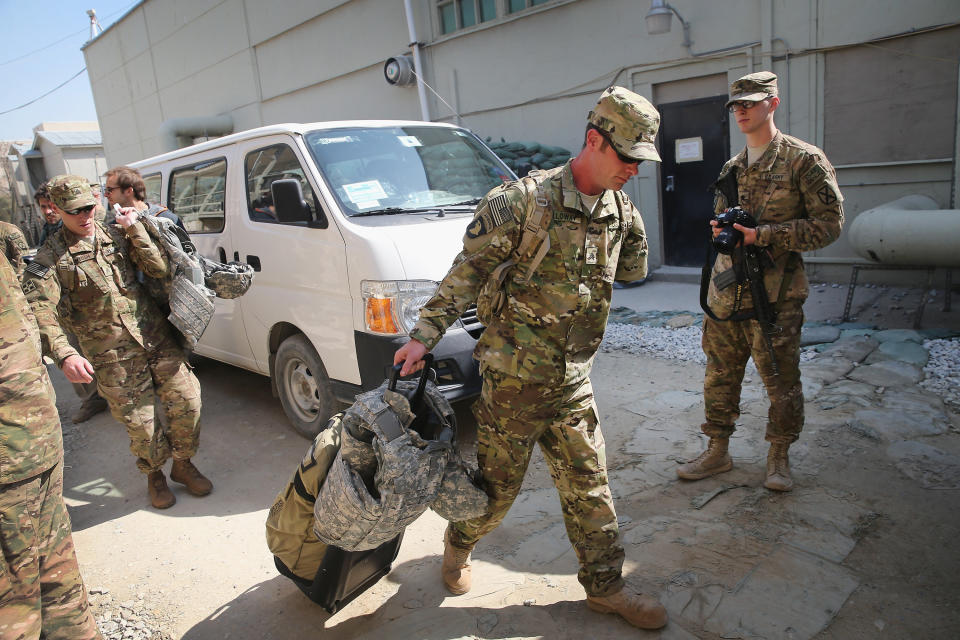 Retired Army Sgt. Noah Galloway&nbsp;of Birmingham, Alabama, arrives at Afghanistan's Bagram Airfield on March 12, 2014. Galloway lost an arm and a leg to an explosion in Iraq in 2005. He was one of five wounded soldiers visiting Afghanistan with the Troops First Operation Proper Exit program, which brings wounded servicemen back to Iraq and Afghanistan to help them come to terms with their injuries. (Photo: Scott Olson via Getty Images)