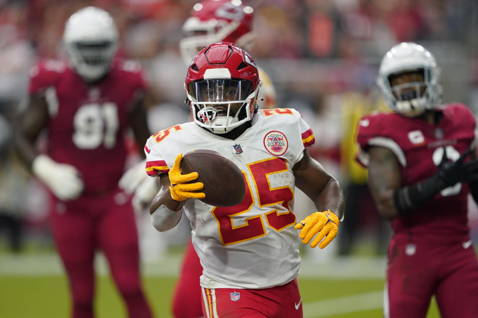 Kansas City Chiefs running back Clyde Edwards-Helaire (25) celebrates after scoring a touchdown against the Arizona Cardinals during the first half of an NFL football game, Sunday, Sept. 11, 2022, in Glendale, Ariz. (AP Photo/Matt York)