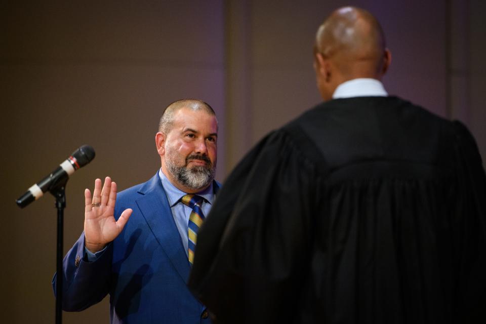 Fayetteville City Council member Deno Hondros is sworn in during the inauguration ceremony on Thursday, Aug. 11, 2022, at Fayetteville State University.