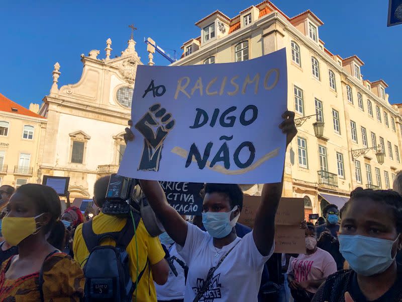 People take part in an anti-racism protest in honour of Bruno Cande in Lisbon