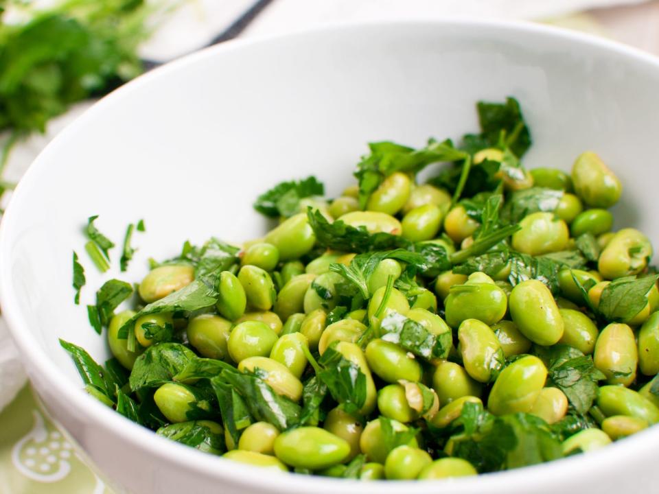 bowl of green edamame and herb salad