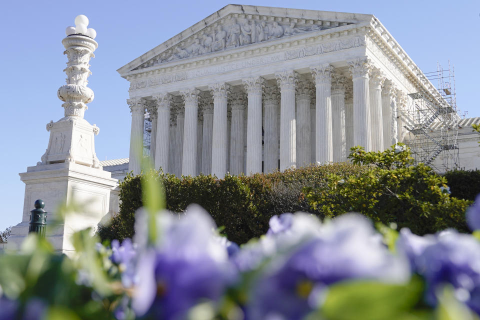 FILE - The U.S Supreme Court is seen, Nov. 3, 2023, in Washington. The Supreme Court is adopting its first code of ethics, in the face of sustained criticism over undisclosed trips and gifts from wealthy benefactors to some justices. The policy was issued by the court Monday. (AP Photo/Mariam Zuhaib, File)