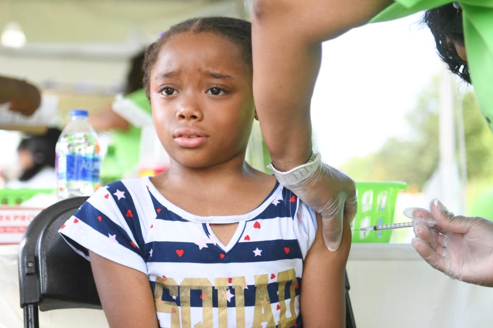 A child receives a coronavirus vaccine in Knoxville, Tennessee in August 2022.