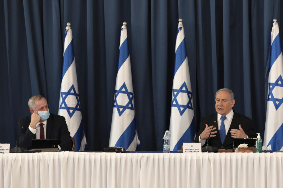 Israeli Minister of Defense and Alternate Prime Minister Benny Gantz, left and Prime Minister Benjamin Netanyahu attend the weekly cabinet meeting, at the foreign ministry, in Jerusalem, Sunday, July 5, 2020. (Photo by Gali Tibbon/Pool via AP)