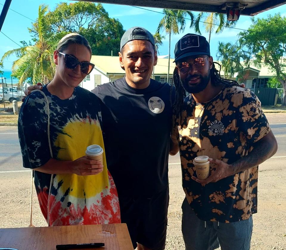 Denne Bourk pictured with NBA star Pattie Mills and partner at his coffee van.