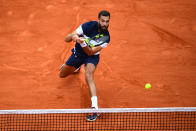 Benoit Paire of France plays a backhand during his mens singles second round match against Pierre-Hugues Herbert of France during Day four of the 2019 French Open at Roland Garros on May 29, 2019 in Paris, France. (Photo by Clive Mason/Getty Images)