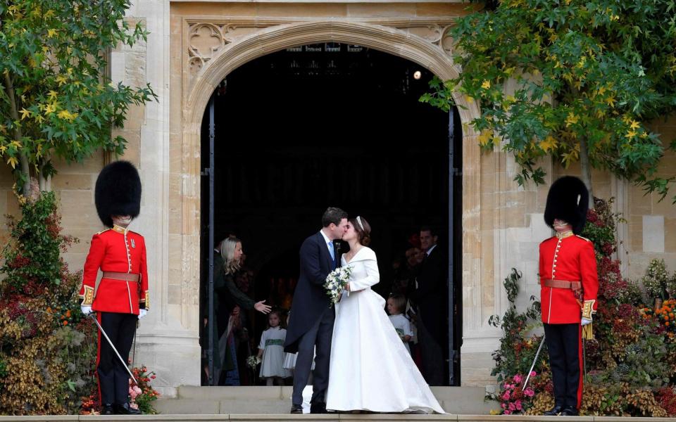 Prince Eugenie and Jack Brooksbank were married at St George's Chapel in 2018 - TOBY MELVILLE/AFP