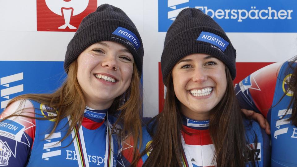 Team USA luge athletes Brittney Arndt and Emily Sweeney celebrate after their podium finishes in the FIL World Cup in Park City, Utah, on Dec. 17.