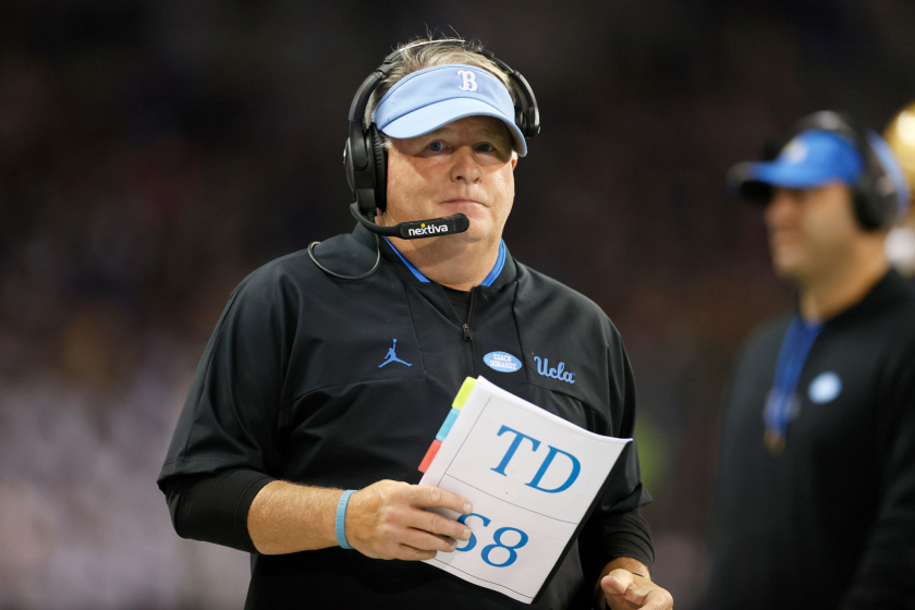 SEATTLE, WASHINGTON - OCTOBER 16: Head coach Chip Kelly of the UCLA Bruins looks on.