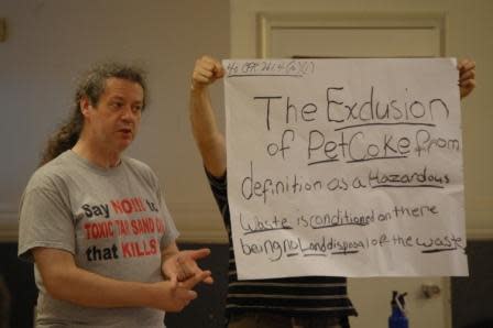 Stephen Boyle has been actively asking and answering questions about petcoke. He explained the intricacies of the EPA's hazardous waste guidelines at a recent community meeting while sporting a t-shirt from HELPPA.org that calls attention to the broader issue of oil sands development.