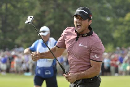 Jason Day celebrates after sinking a birdie putt on the 18th during final-round action at the Canadian Open golf tournament in Oakville, Ontario, Sunday, July 26, 2015. Day won the tournament. (Paul Chiasson/The Canadian Press via AP) MANDATORY CREDIT