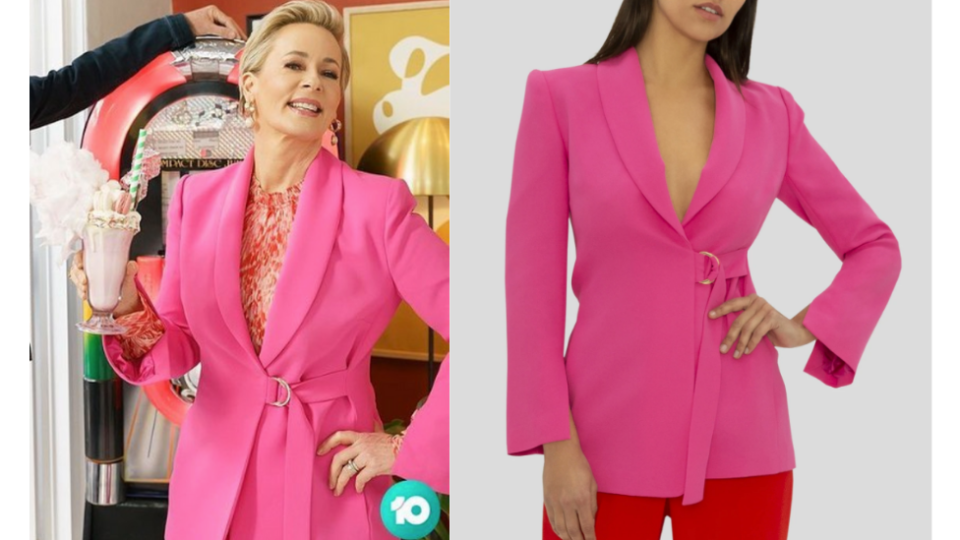 Amanda Keller wearing a pink power suit