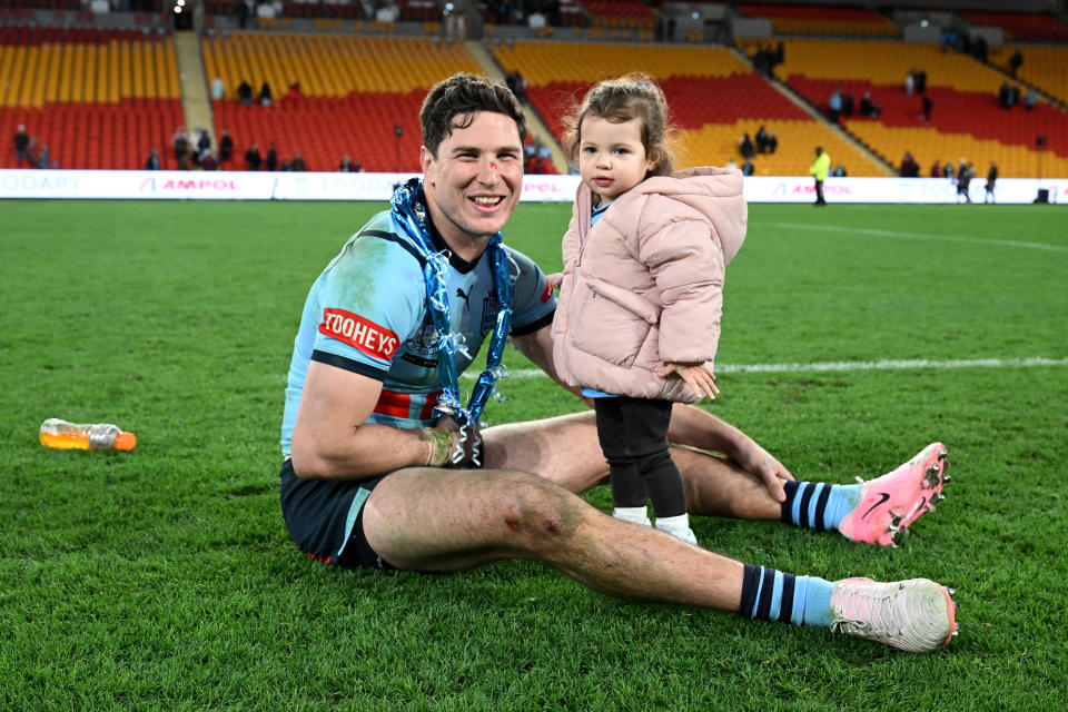 Mitchell Moses with his daughter.