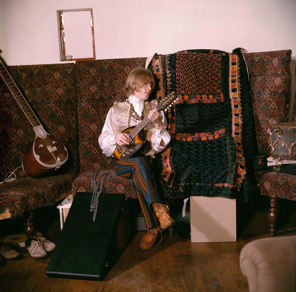 Brian Jones at home on a settee. Courtfield Gardens, South KensingtonGered Mankowitz