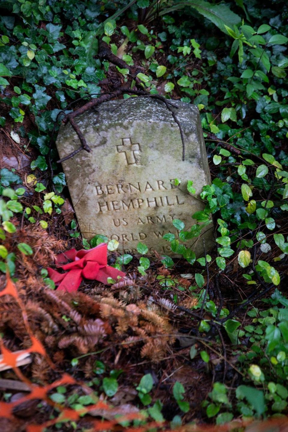 A gravestone at Cedar Grove Cemetery in west Charlotte. The 1.8-acre cemetery has been abandoned for the past 50 years, but volunteers have been clearing the site over the past two years.