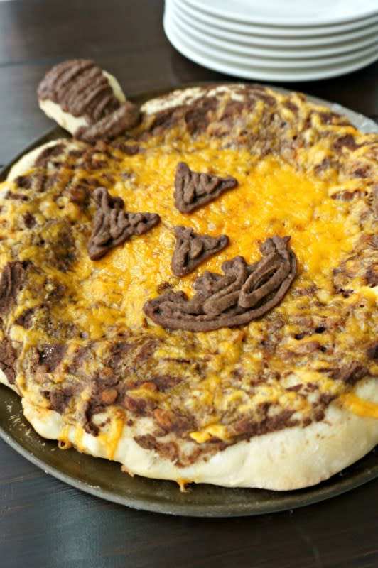 <p>A Mind Full Mom</p><p>Turn this Tex-Mex treat into something cute to eat.</p><p><strong>Get the recipe: <a href="http://amindfullmom.com/pumpkin-mexican-pizza/" rel="nofollow noopener" target="_blank" data-ylk="slk:Pumpkin Mexican Pizza;elm:context_link;itc:0;sec:content-canvas" class="link rapid-noclick-resp">Pumpkin Mexican Pizza</a></strong></p><p><strong>Related: <a href="https://parade.com/1056251/marynliles/halloween-jokes/" rel="nofollow noopener" target="_blank" data-ylk="slk:Best Halloween Jokes;elm:context_link;itc:0;sec:content-canvas" class="link rapid-noclick-resp">Best Halloween Jokes</a></strong></p>