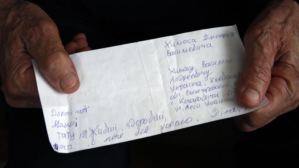 The handwritten note Halyna and Vasyl Khyliuk received from their son Dima. - Ivana Kottasova/CNN