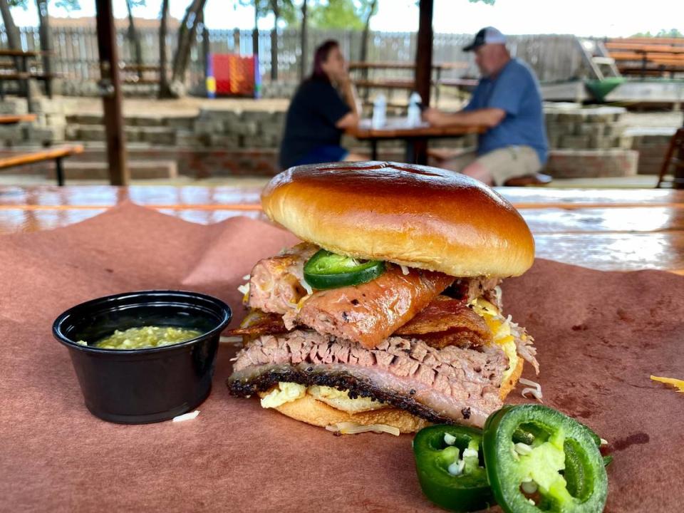 A breakfast sandwich with brisket, sausage and an egg at Panther City BBQ.