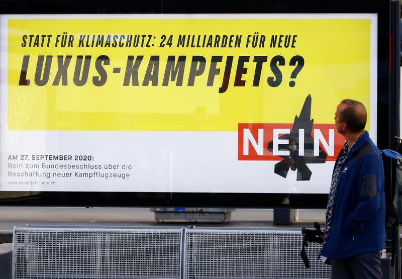 A poster against the acquisition of new fighting jets is seen in Adliswil
