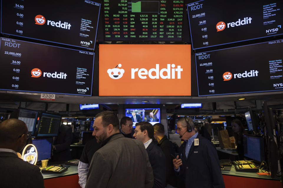 Reddit Inc. signage is seen on the New York Stock Exchange trading floor, prior to Reddit IPO, Thursday, March. 21, 2024. (AP Photo/Yuki Iwamura)