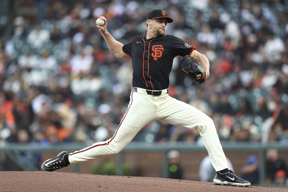 San Francisco Giants pitcher Keaton Winn throws to a San Diego Padres batter during the first inning of a baseball game in San Francisco, Saturday, April 6, 2024. (AP Photo/Kavin Mistry)