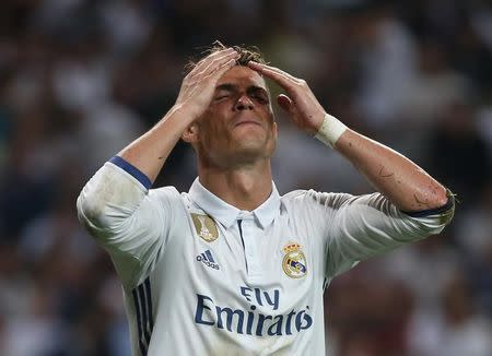 Football Soccer - Real Madrid v FC Barcelona - Spanish Liga Santander - Santiago Bernabeu, Madrid, Spain - 23/4/17 Real Madrid's Cristiano Ronaldo looks dejected after missing a chance to score Reuters / Sergio Perez Livepic - RTS13LAI