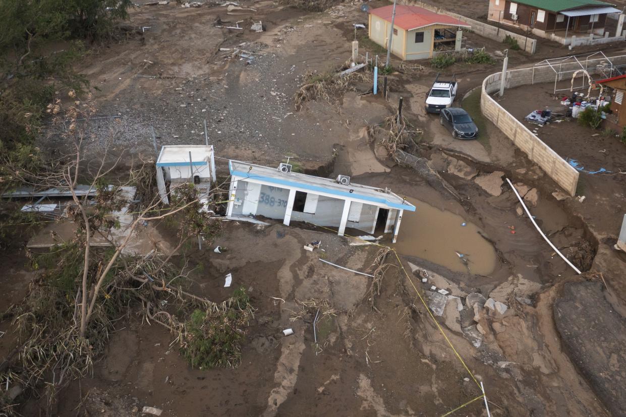 A house in Puerto Rico lays in mud on Sept. 21.