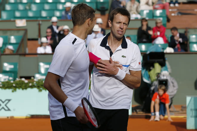 Belarus Max Mirnyi (L) and Canada's Daniel Nestor react after wining over US Bob Bryan and US Mike Bryan during Men's Doubles final tennis match of the French Open tennis tournament at the Roland Garros stadium, on June 9, 2012 in Paris. AFP PHOTO / THOMAS COEXTHOMAS COEX/AFP/GettyImages