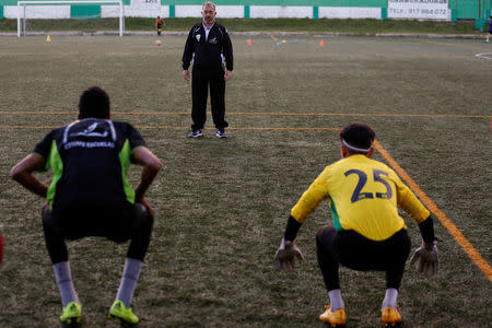 Osama Abdul Mohsen, a Syrian refugee, whistles during a training session with his junior team in Villaverde, a neighbourhood in Madrid, Spain, April 14, 2016. REUTERS/Sergio Perez