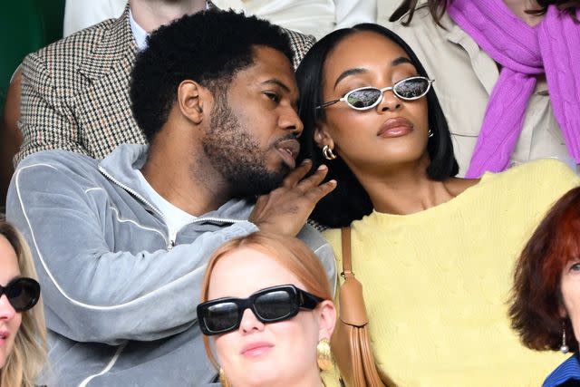 <p>Karwai Tang/WireImage</p> Dion Hamilton and Jourdan Dunn at Wimbledon