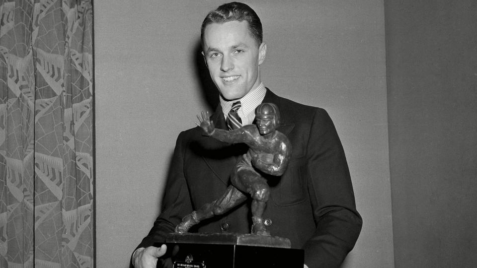 Mandatory Credit: Photo by Uncredited/AP/REX/Shutterstock (6657815b)Bruce Smith Captain of the University of Minnesota Bruce Smith, left, receives the Heisman trophy in New YorkBruce Smith with Heisman Trophy, New York, USA.