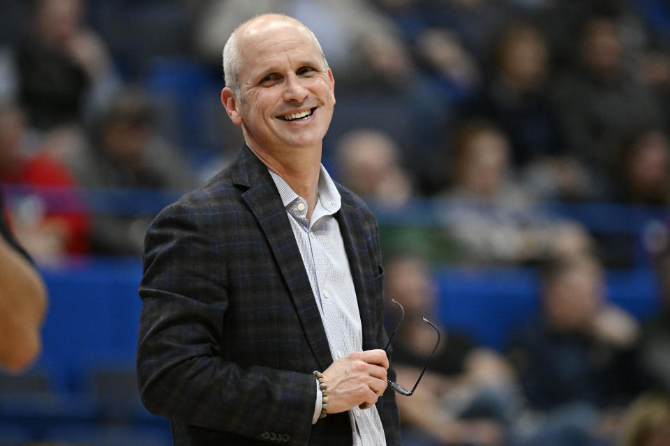FILE - UConn head coach Dan Hurley smiles at an official in the second half of an NCAA college basketball game against Mississippi Valley State, Tuesday, Nov. 14, 2023, in Hartford, Conn. Hurley is the coach of the year in balloting released Tuesday, March 12, 2024.(AP Photo/Jessica Hill, File)