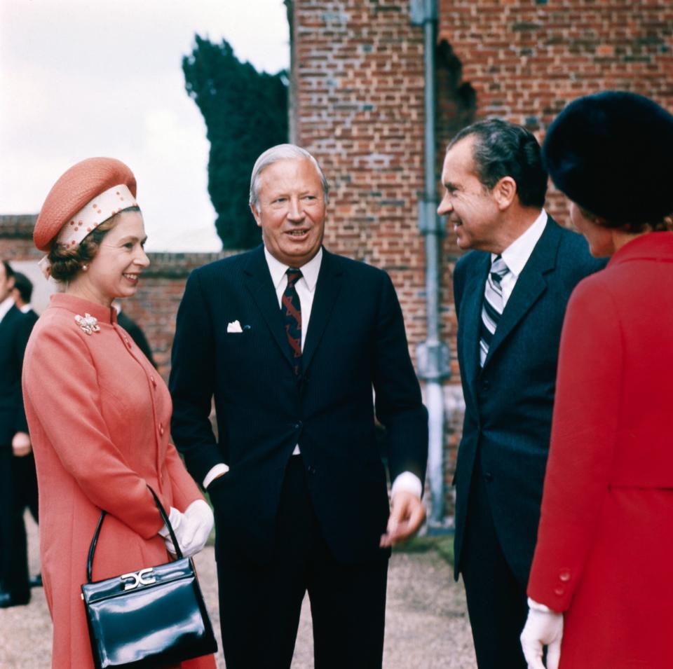 (Original Caption) In the Premier's Garden. Checquers, Nr. Wendover, Bucks: Admiring the garden of the Prime Minister's country home of Checquers are (left to right) Mrs. Pat Nixon; British Premier Mr. Edward Heath; Queen Elizabeth and U.S. President and his wife are on a short tour of European countries.