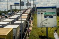 Trucks blocked at the entrance to the cross-Channel tunnel in Coquelles near Calais, northern France on July 29, 2015