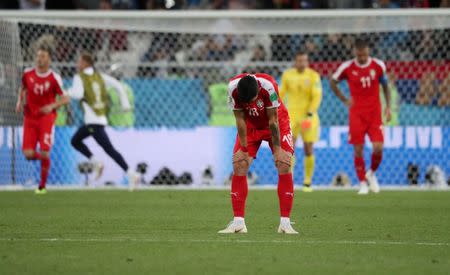 Soccer Football - World Cup - Group E - Serbia vs Switzerland - Kaliningrad Stadium, Kaliningrad, Russia - June 22, 2018 Serbia's Nemanja Radonjic looks dejected after Switzerland's Xherdan Shaqiri (not pictured) scored their second goal REUTERS/Ricardo Moraes