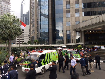 Ambulances are seen following reports of a collapsed structure inside the Indonesian Stock Exchange building in Jakarta, Indonesia, January 15, 2018. REUTERS/Darren Whiteside