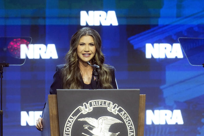 South Dakota Gov. Kristi Noem speaks at the National Rifle Association Convention, Friday, April 14, 2023, in Indianapolis. / Credit: Darron Cummings/AP