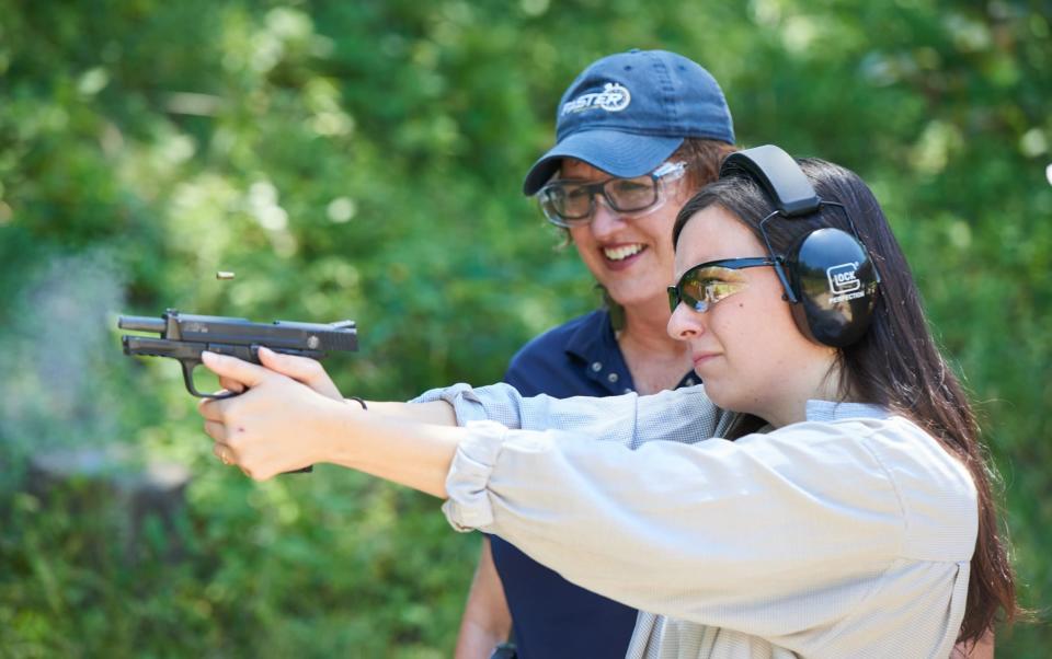 Telegraph journalist learns to fire a handgun under the guidance of Angela Armstrong, an instructor at the Tactical Defense Institute in West Union, Ohio. - Stephen Takacs