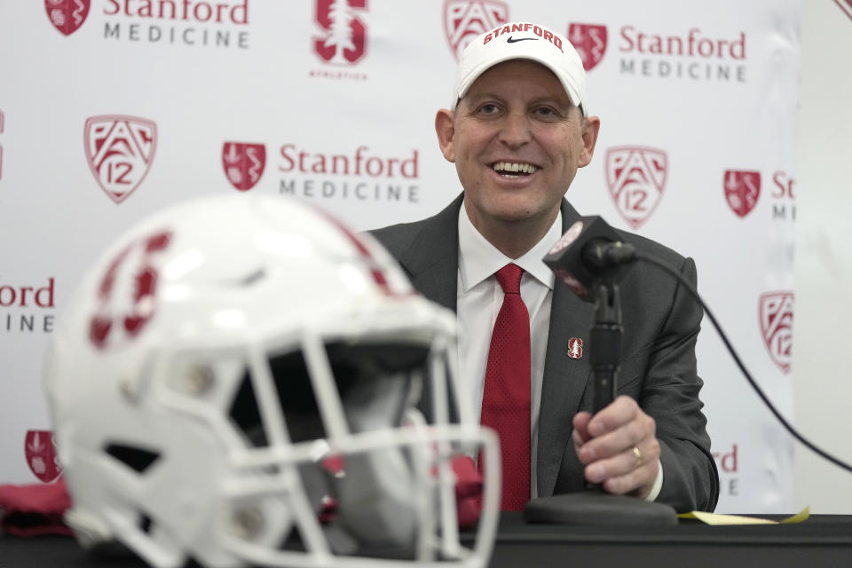 Troy Taylor smiles as he speaks after being introduced as the new head football coach at Stanford during a news conference, Monday, Dec. 12, 2022, in Stanford, Calif. (AP Photo/Tony Avelar)