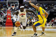 WASHINGTON, DC - JULY 16: LeBron James #6 of the US Men's Senior National Team dribbles past Alex Riberiro Garcia #8 of Brazil in the first quarter during a pre-Olympic exhibition basketball game at the Verizon Center on July 16, 2012 in Washington, DC. (Photo by Patrick Smith/Getty Images)