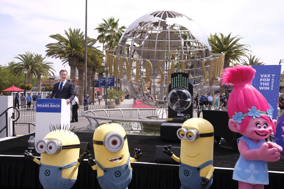 California Governor Gavin Newsom talks during a news conference at Universal Studios in Universal City, Calif. on Tuesday, June 15, 2021. Starting Tuesday, there were no more state rules on social distancing, and no more limits on capacity at restaurants, bars, supermarkets, gyms, stadiums or anywhere else. (AP Photo/Ringo H.W. Chiu)