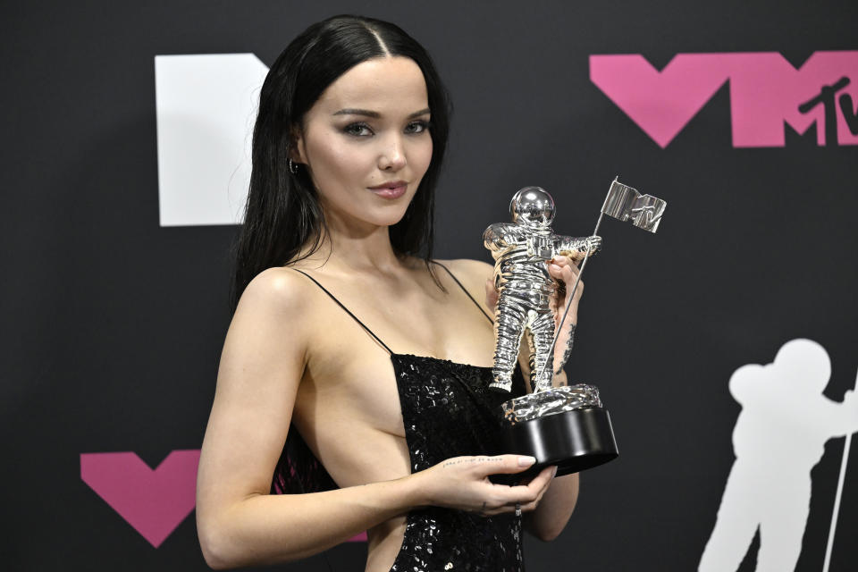 FILE - Dove Cameron, winner of the award for video for good for "Breakfast", poses in the press room at the MTV Video Music Awards on Sept. 12, 2023, in Newark, N.J. Cameron's latest album “Alchemical: Volume 1," releases Dec. 1. (Photo by Evan Agostini/Invision/AP, File)