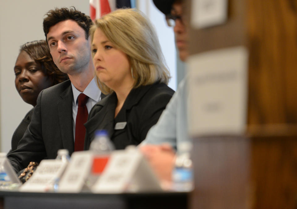 Democrat Jon Ossoff listens to other candidates speak during the League of Women Voters' candidate forum for Georgia's 6th Congressional District special election to replace Tom Price, who is now the secretary of Health and Human Services, in Marietta, Georgia, U.S. April 3, 2017. Picture taken April 3, 2017. REUTERS/Bita Honarvar