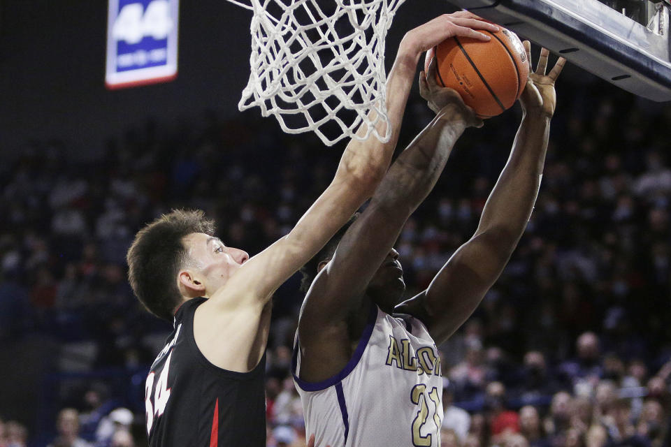 Gonzaga center Chet Holmgren, left, blocks a shot by Alcorn State forward Ladarius Marshall during the first half of an NCAA college basketball game Monday, Nov. 15, 2021, in Spokane, Wash. (AP Photo/Young Kwak)